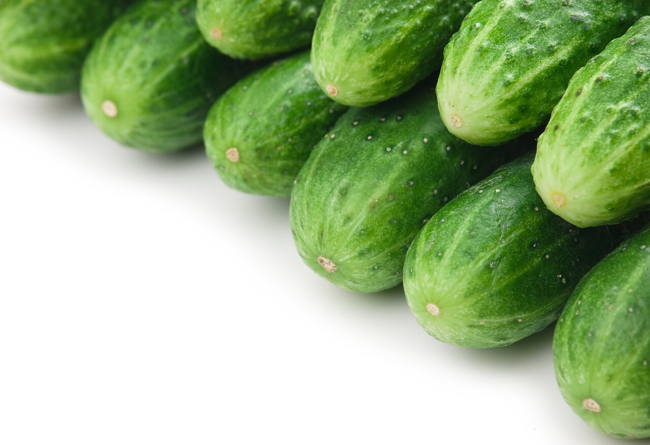 白底一堆创意排版黄瓜图片