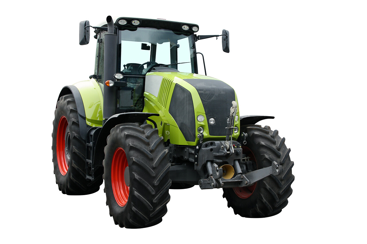 白色背景上的绿色拖拉机