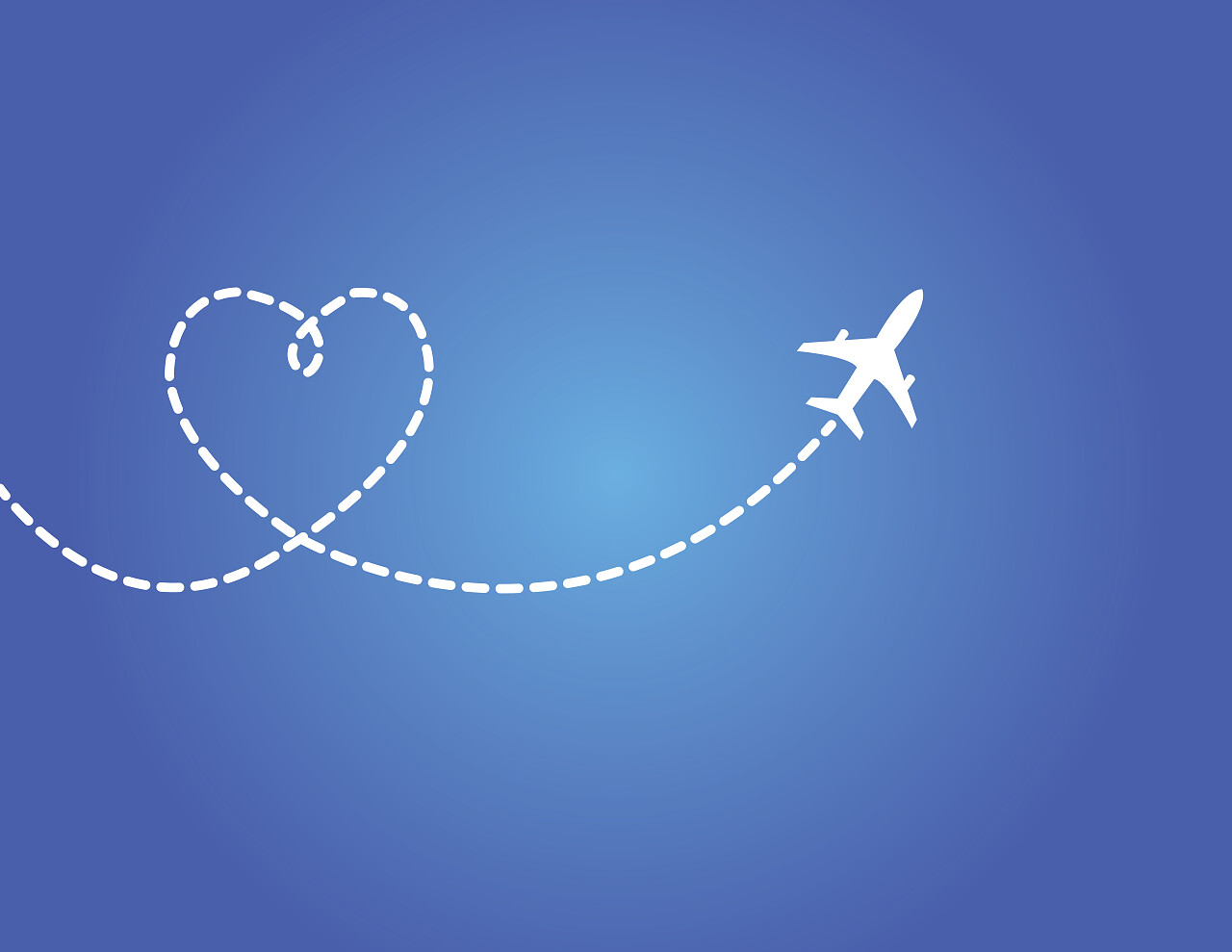 一架飞机飞行在暗蓝色的天空留下了心型的爱烟径爱情七夕520情人节214情人节