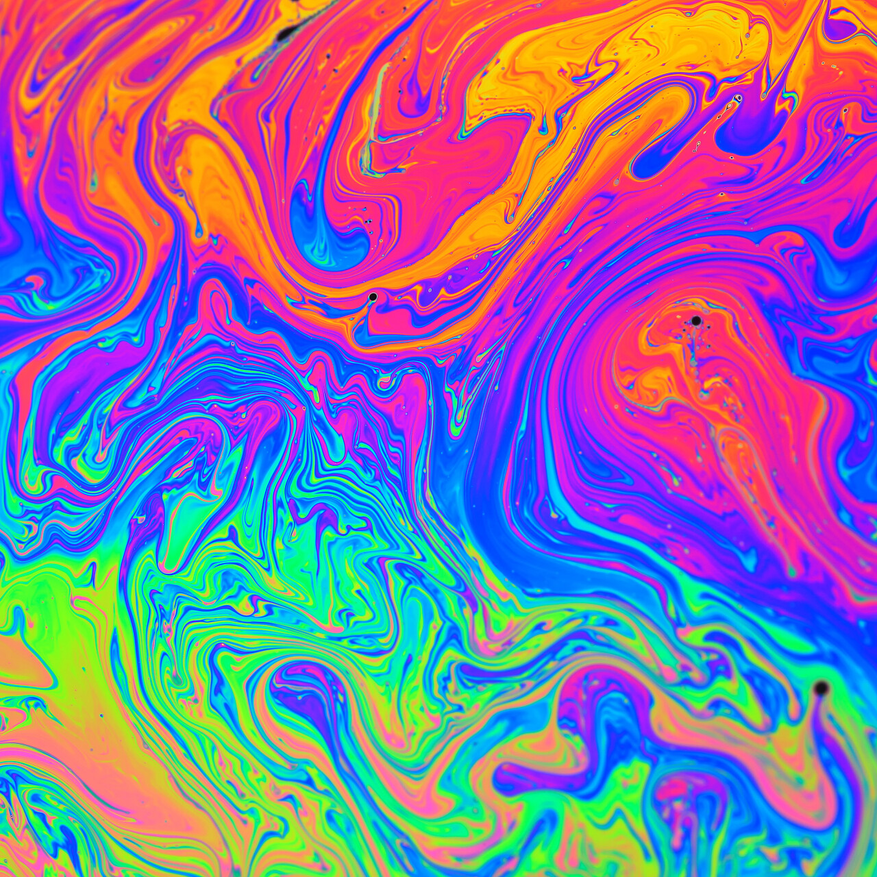 彩虹的颜色由肥皂泡沫或油使得可以使用背景