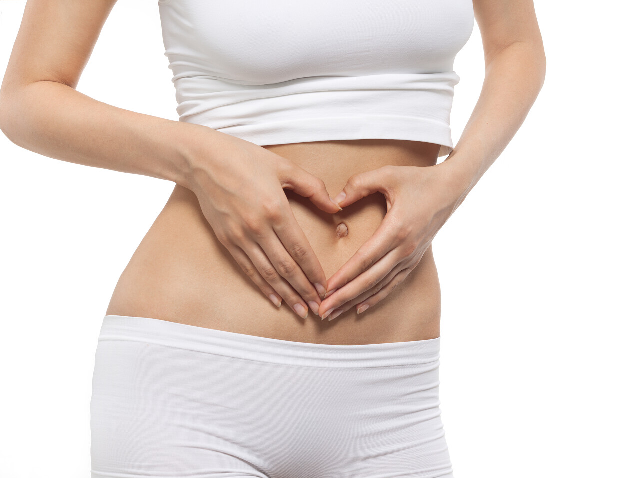 有吸引力的年轻白种女人身体躯干白色工作室孤立射击图胃肚子痛