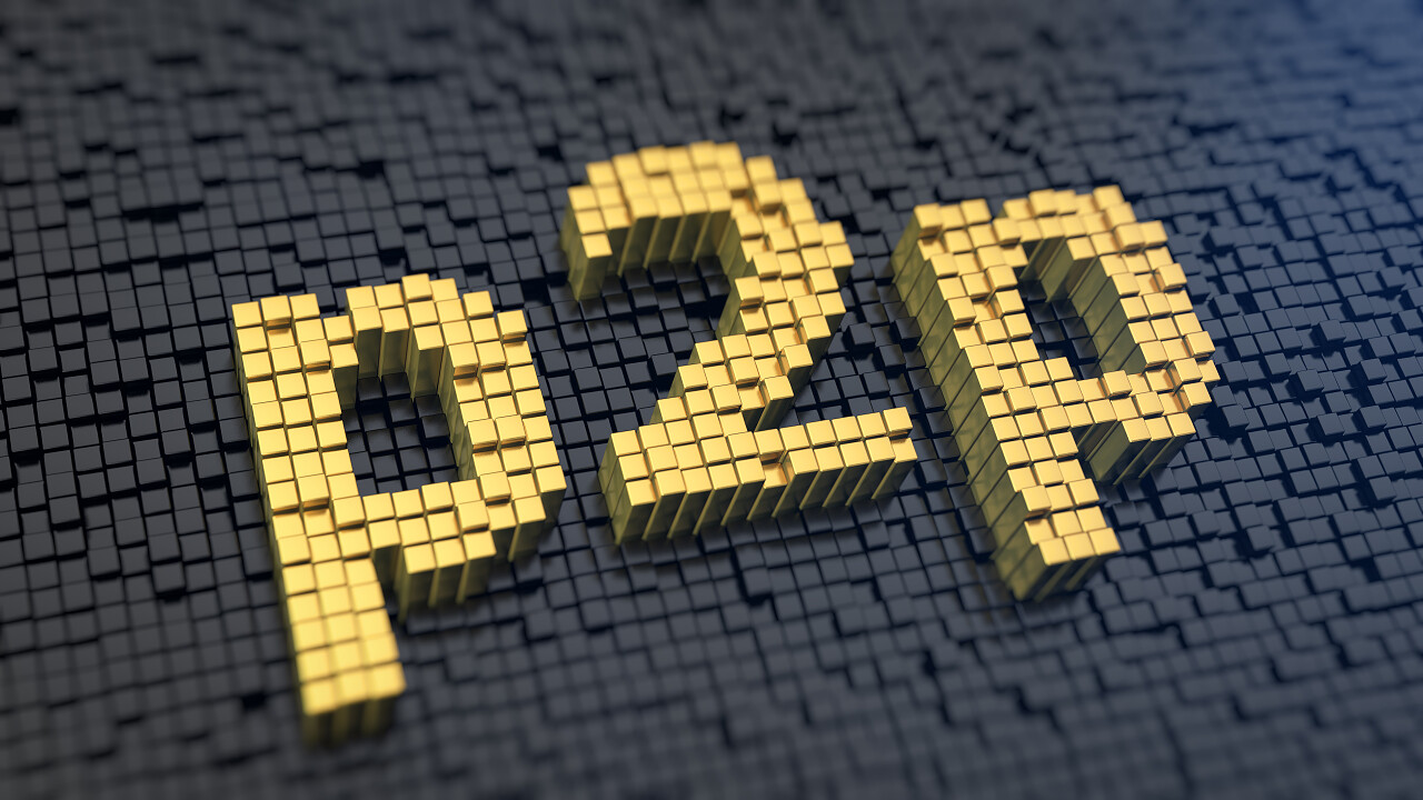 首字母的黄色正方形像素矩阵黑色背景上