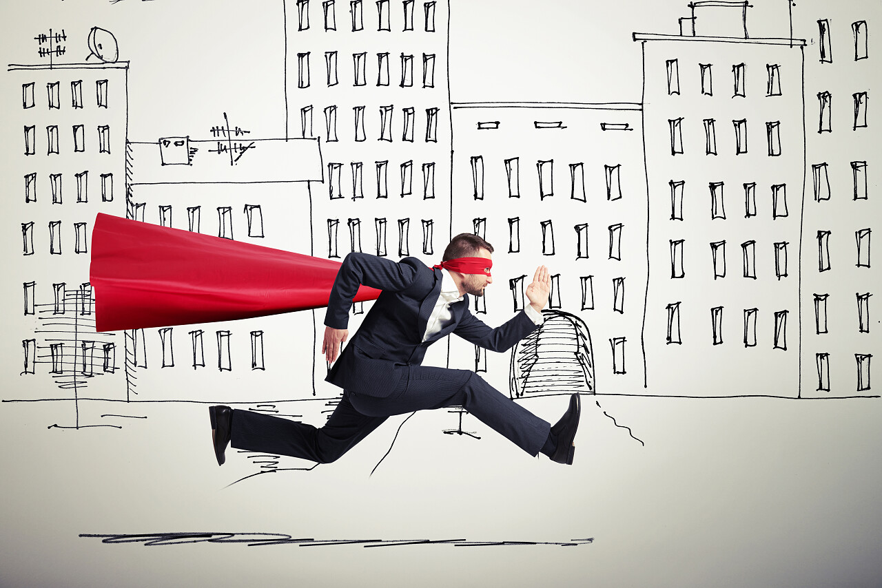 穿着像超级英雄衣服的商人非快穿梭在街上励志领导力提升