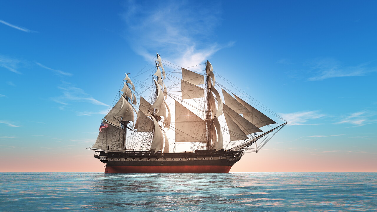 蓝色天空下正在行驶的帆船坚持蓝色大海杨帆起航