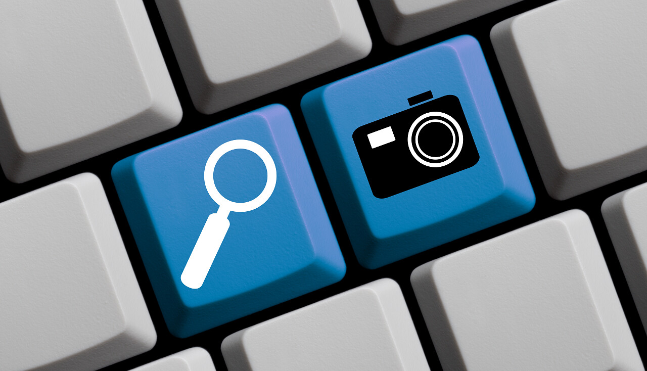 电脑键盘上的符号是搜索键和相机键