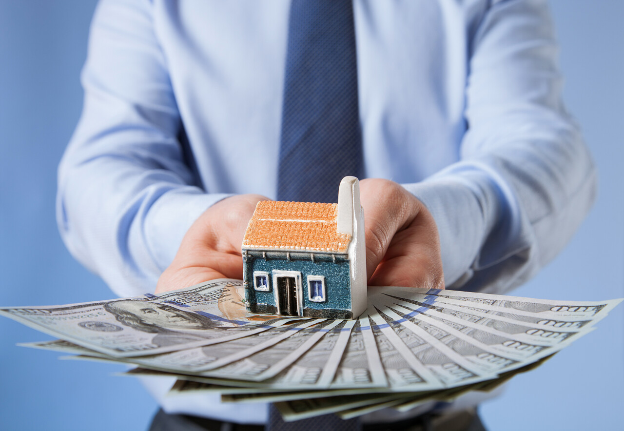 商人提供要买新房子特写拍摄房地产投资