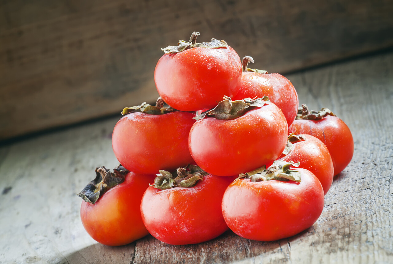 橙色的柿子堆成形状霜降秋分