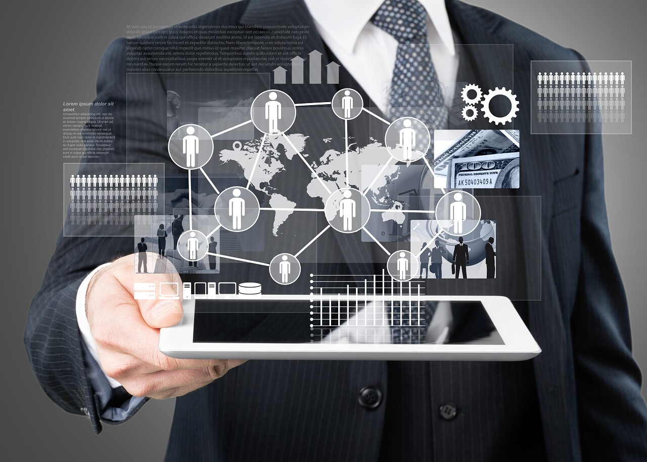 商人持有数字平板电脑的业务图标