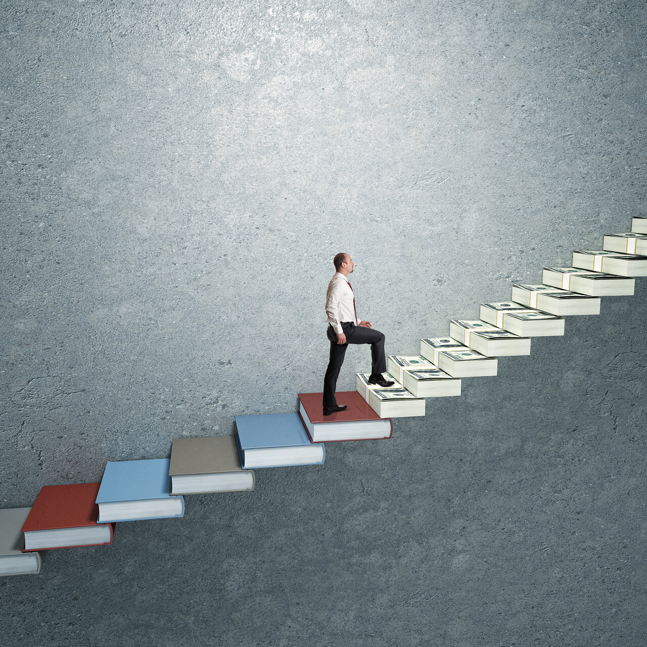 男人上建立起来的钱和书的楼梯努力坚持不懈克服困难