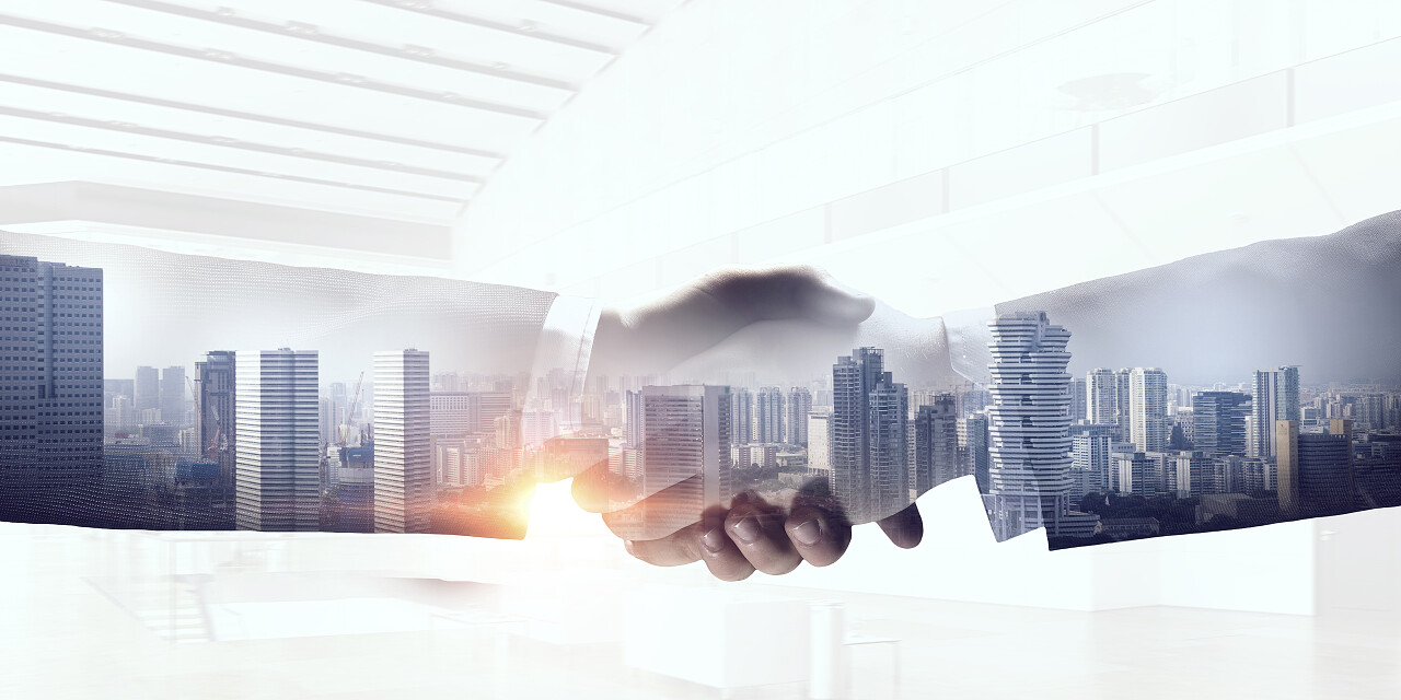 在背景下的商业握手的特写合作团结握手企业团结团结合作平台商务人士合作握手