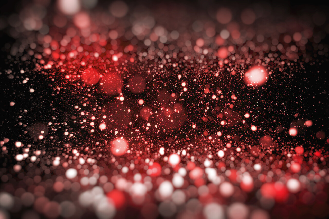 黑色和红色图案由明亮的散景