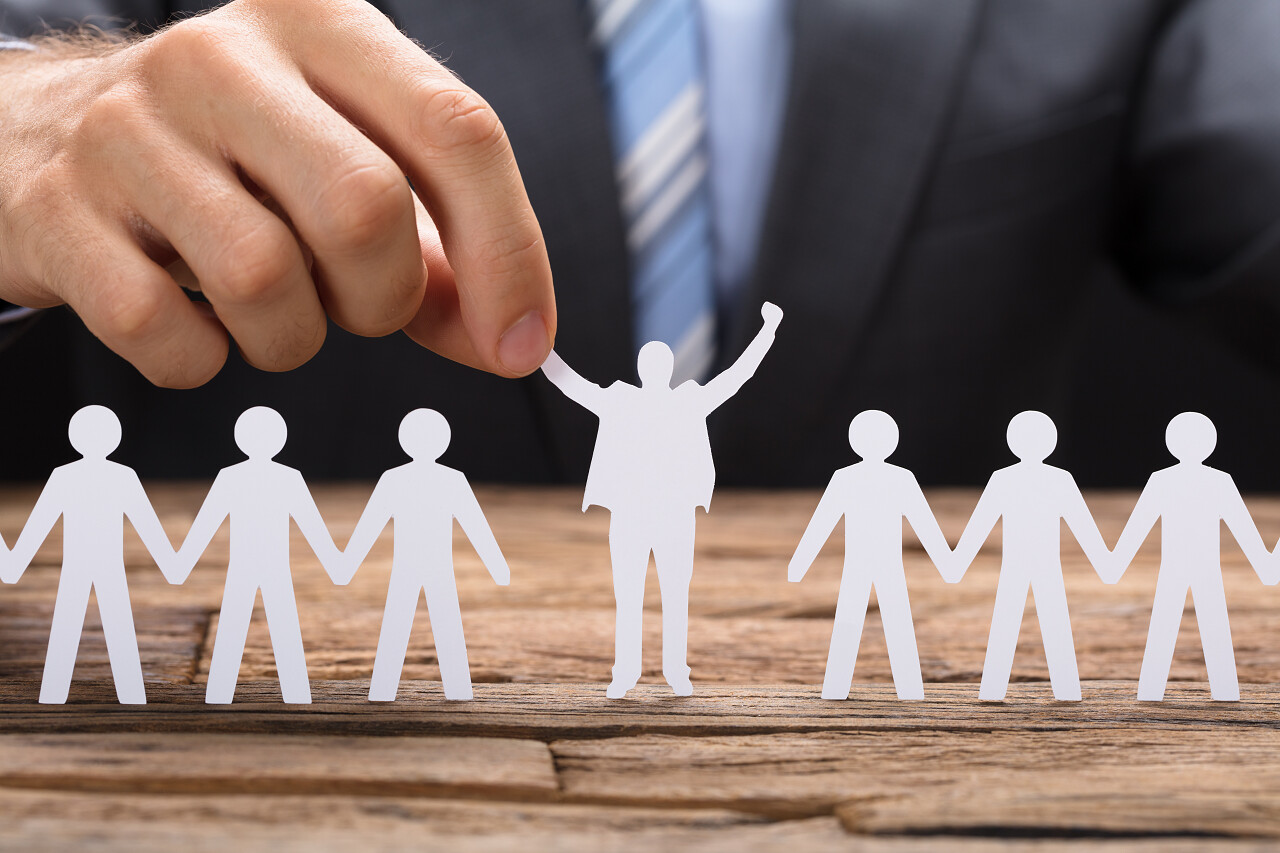 商人控股报成功的团队概念图