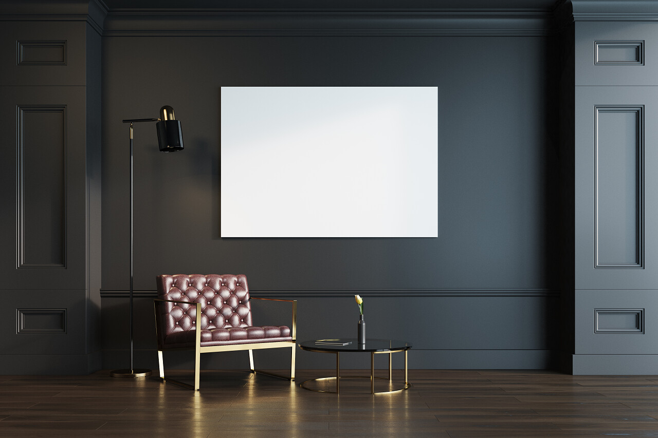 黑色客厅内有一个木地板一个真皮扶手椅和一个圆形的茶几