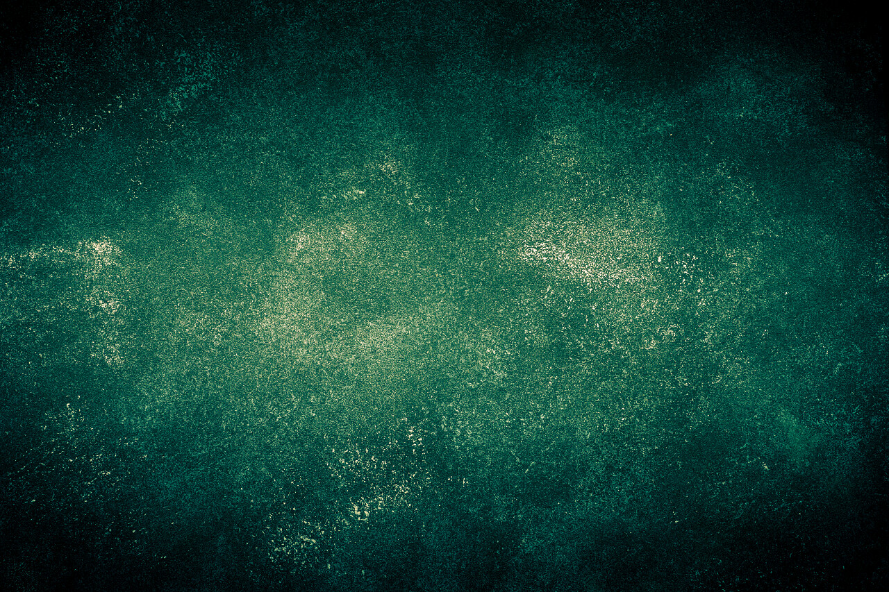 黑色和绿色的石背景