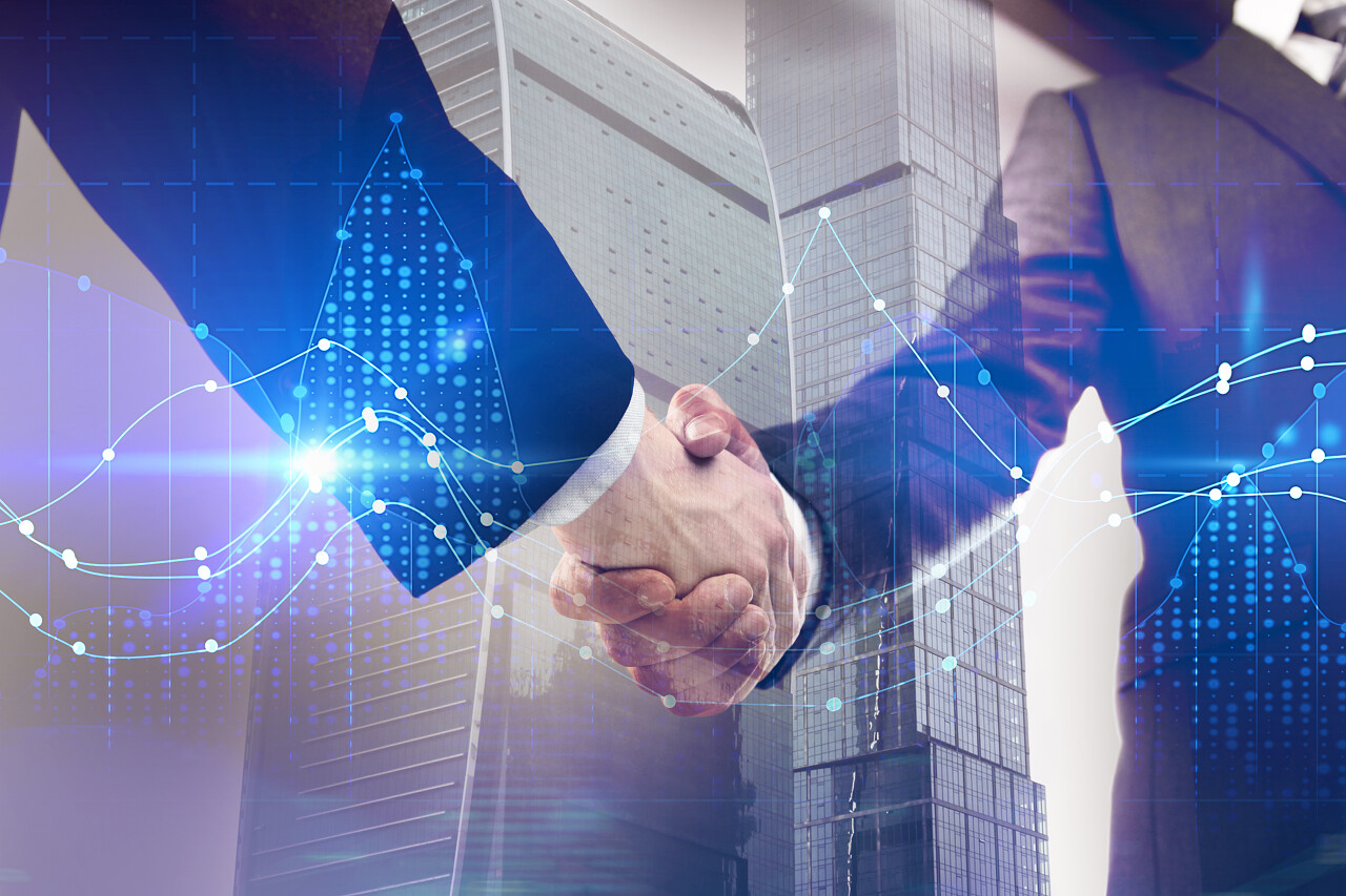 在抽象背景下的握手合作团结握手企业团结团结合作平台商务人士合作握手