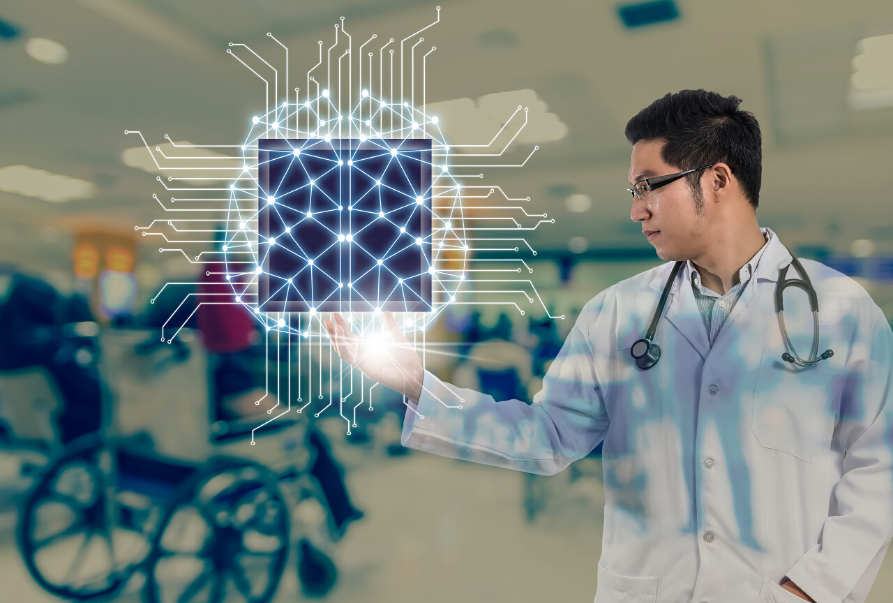 亚洲医生用听诊器设备手持脑技术的人工智能在抽象照片模糊的医院背景,