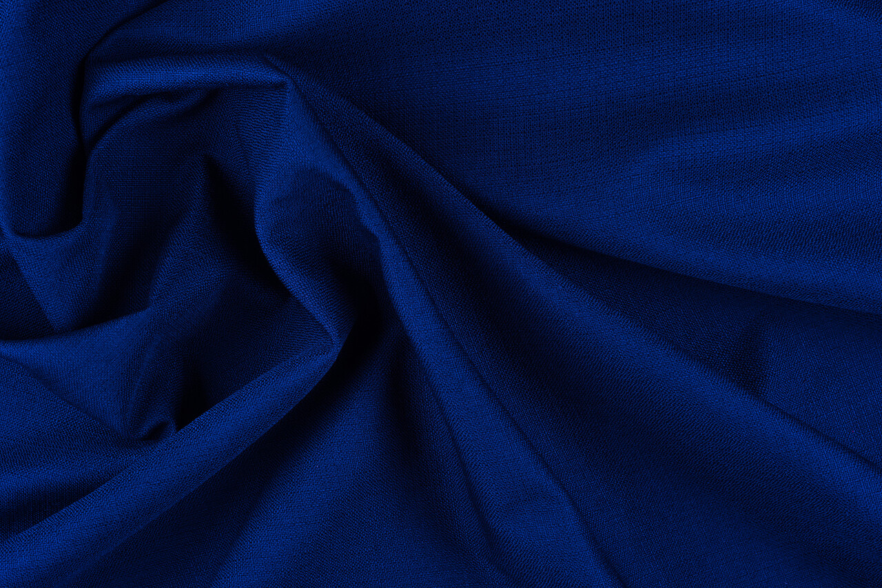 纺织品和质感概念紧贴皱曲的面料背景摘要背景