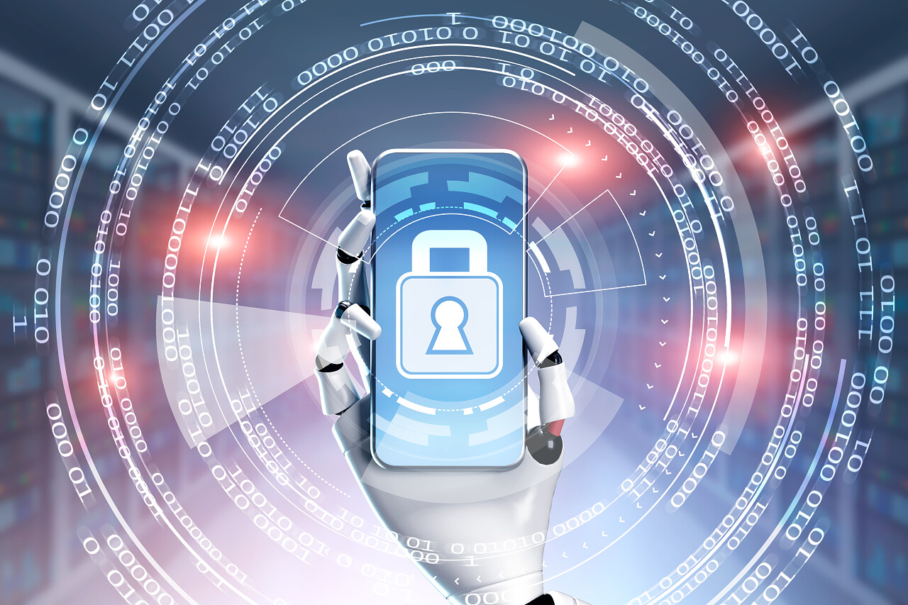 白色机器人手拿着一个智能手机