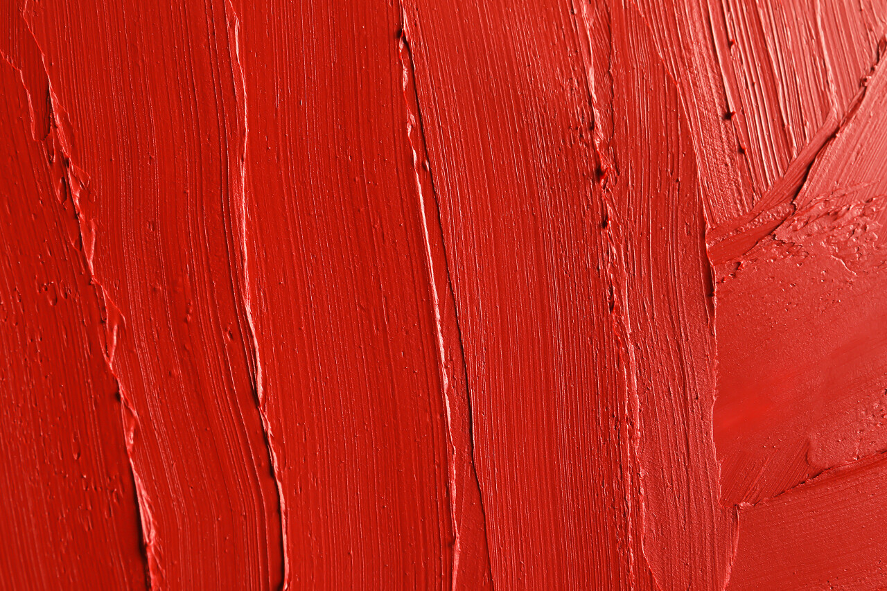 红色口红抹黑作为背景特写镜头化妆品