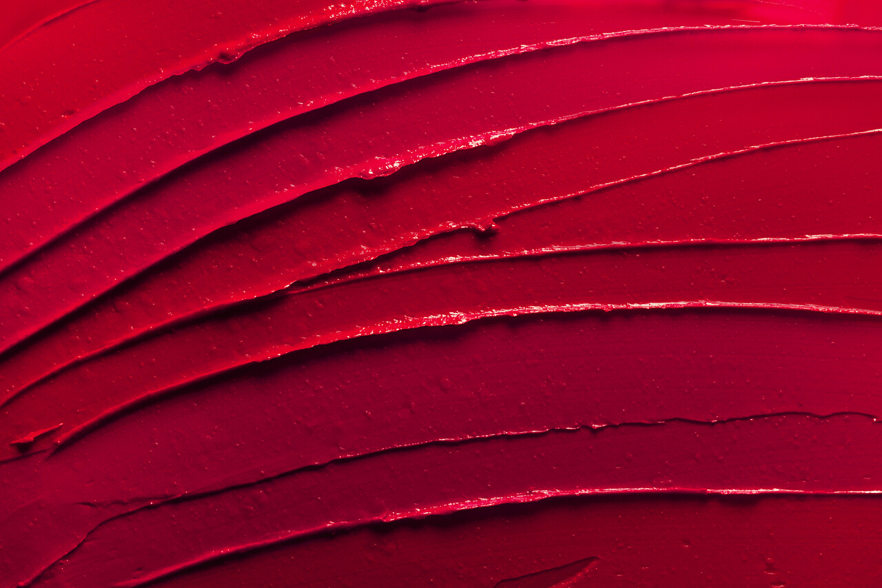 唇膏污迹波红色纹理背景