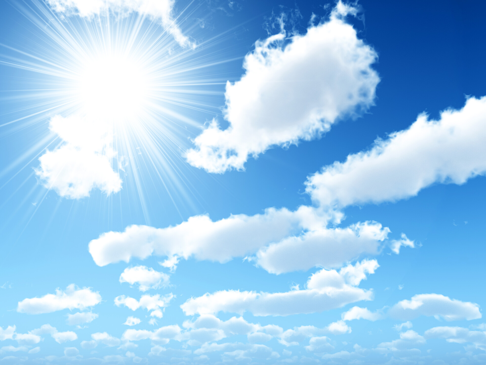 天空中太阳穿过云层明亮的太阳光束