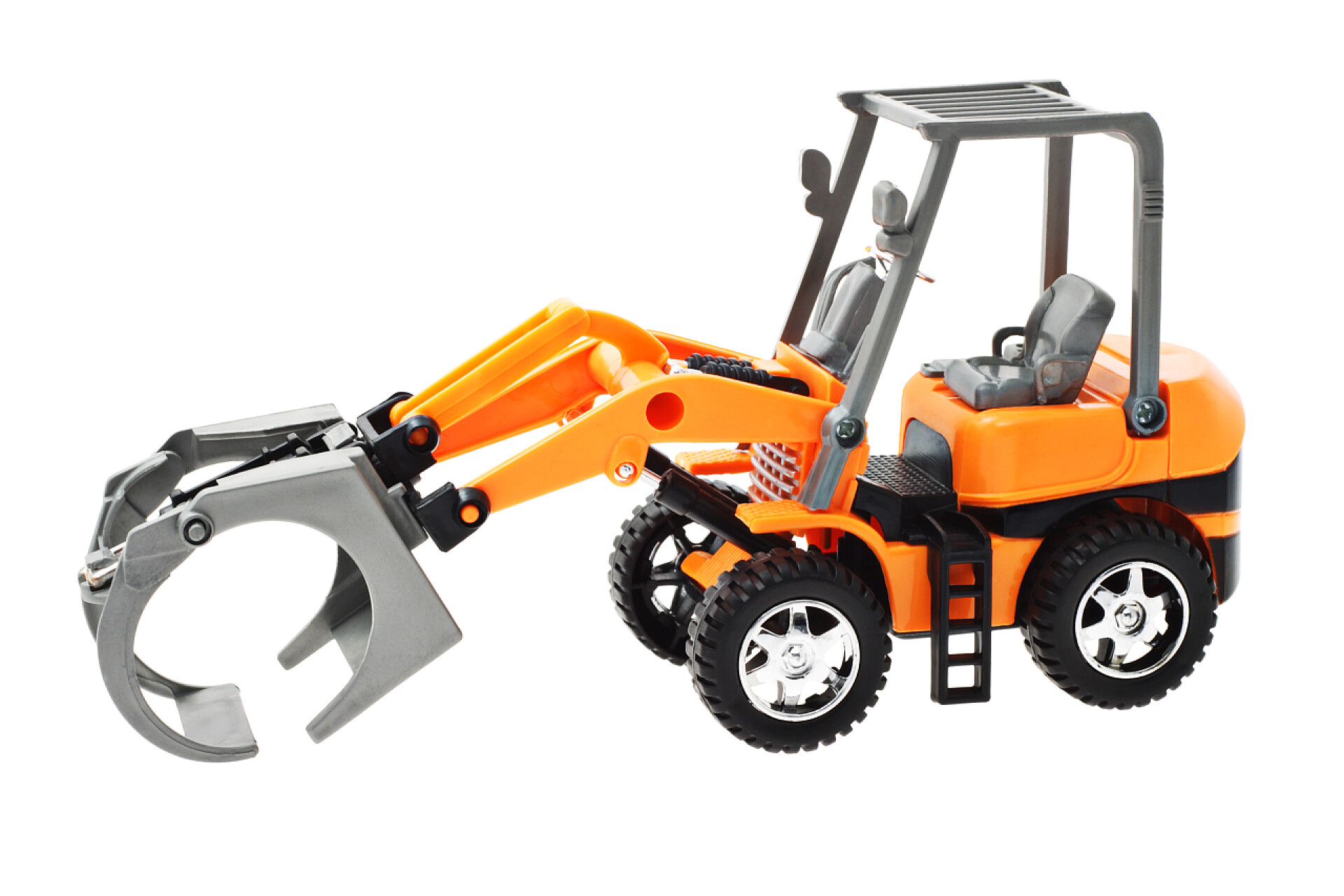 在白色背景上的格斗装载机拖拉机玩具模型格斗装载机拖拉机