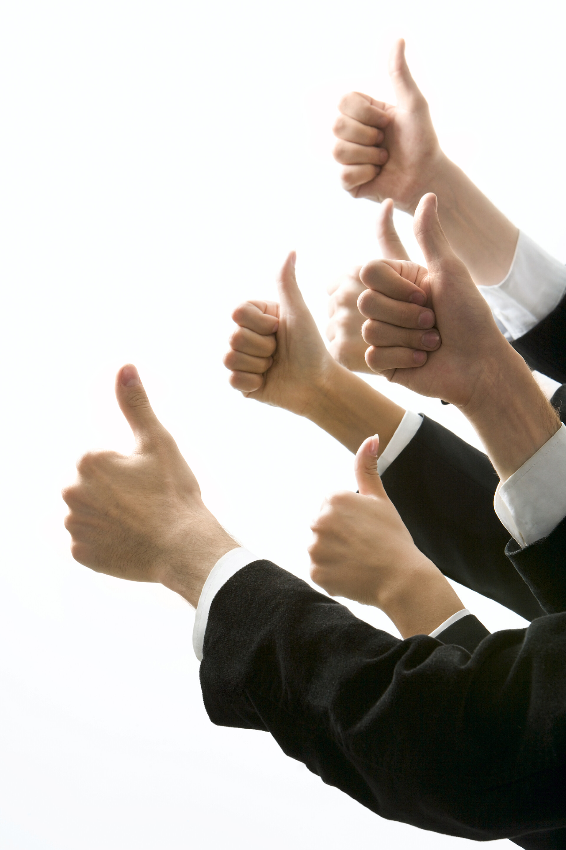 白色背景一些人竖起大拇指成功的愿望