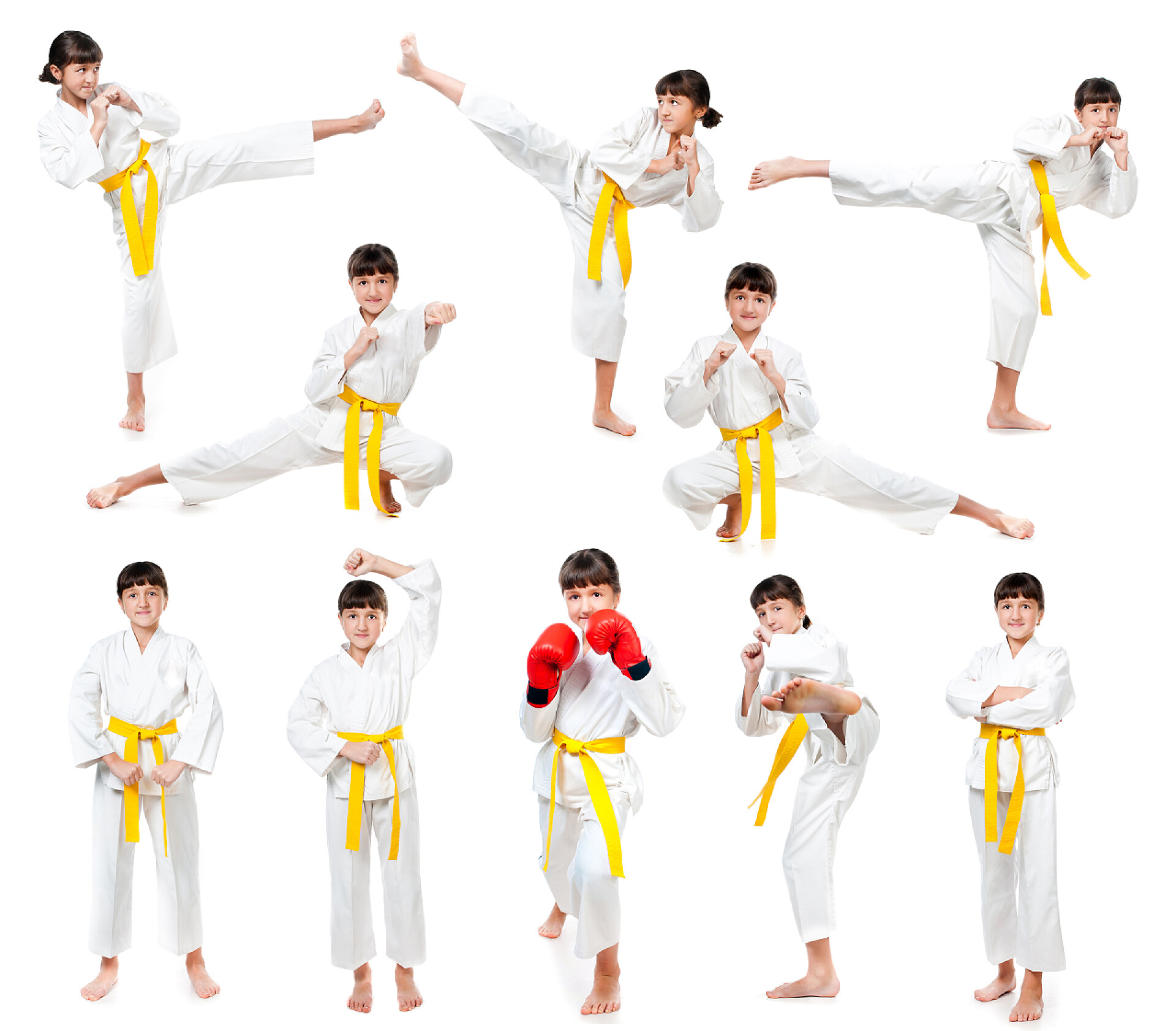 白色背景练习跆拳道的女孩儿与黄色腰带和服的小女孩