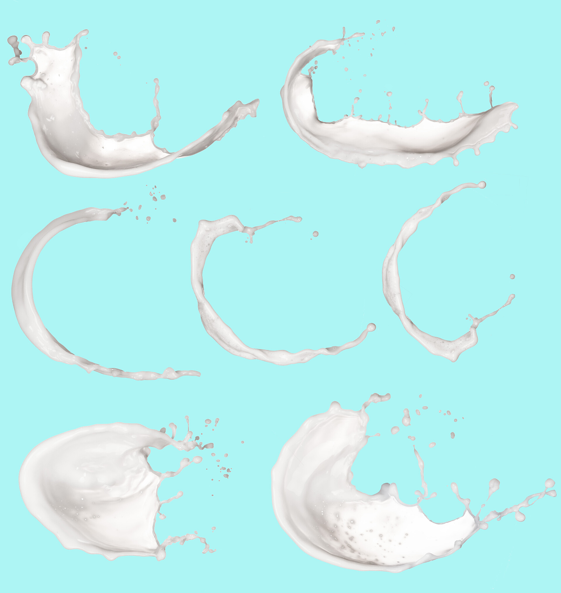 在蓝色底色上分离的溅出牛奶抛物线奶水