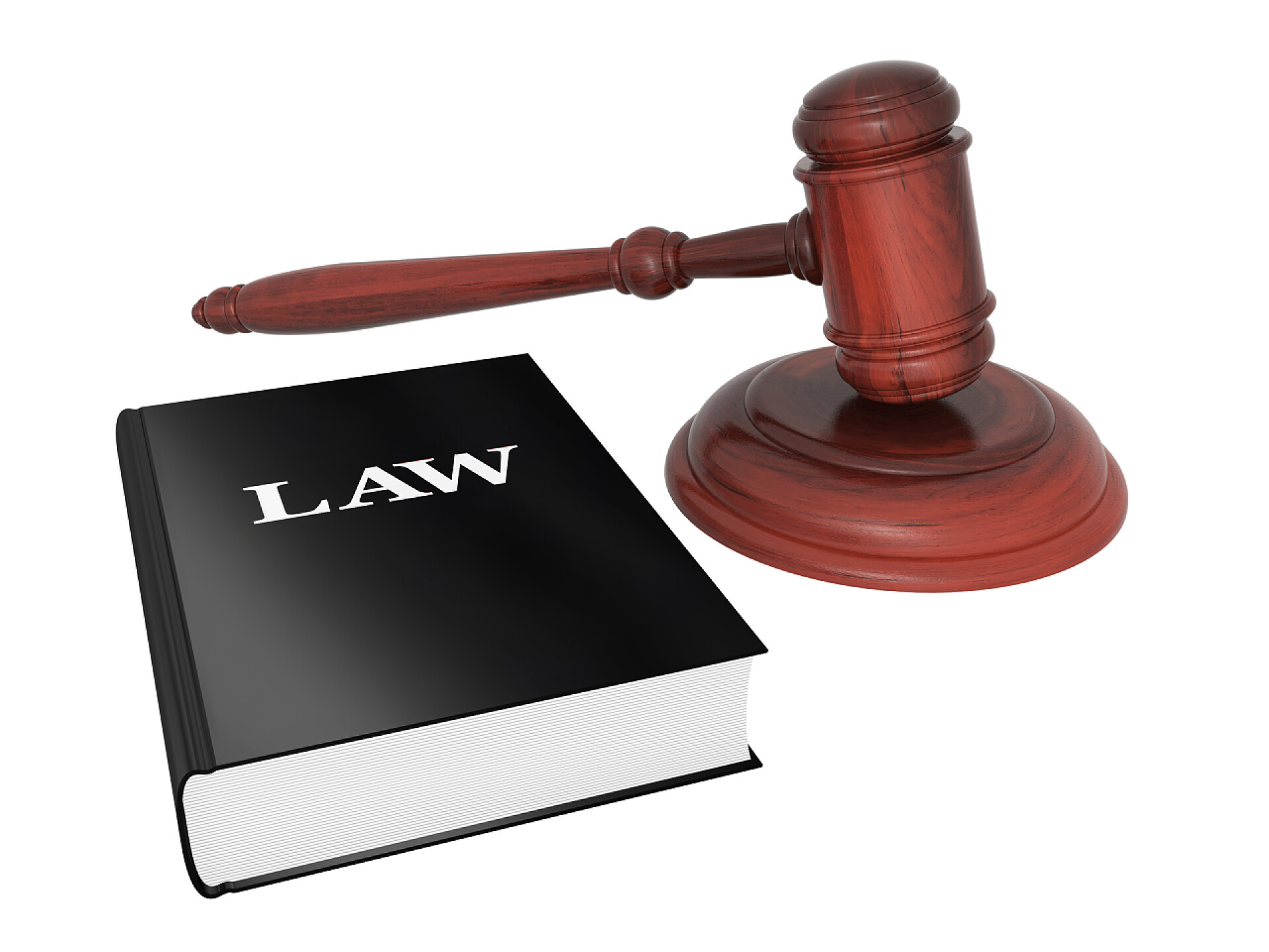 白色背景上的木槌和法律书木槌和法律书