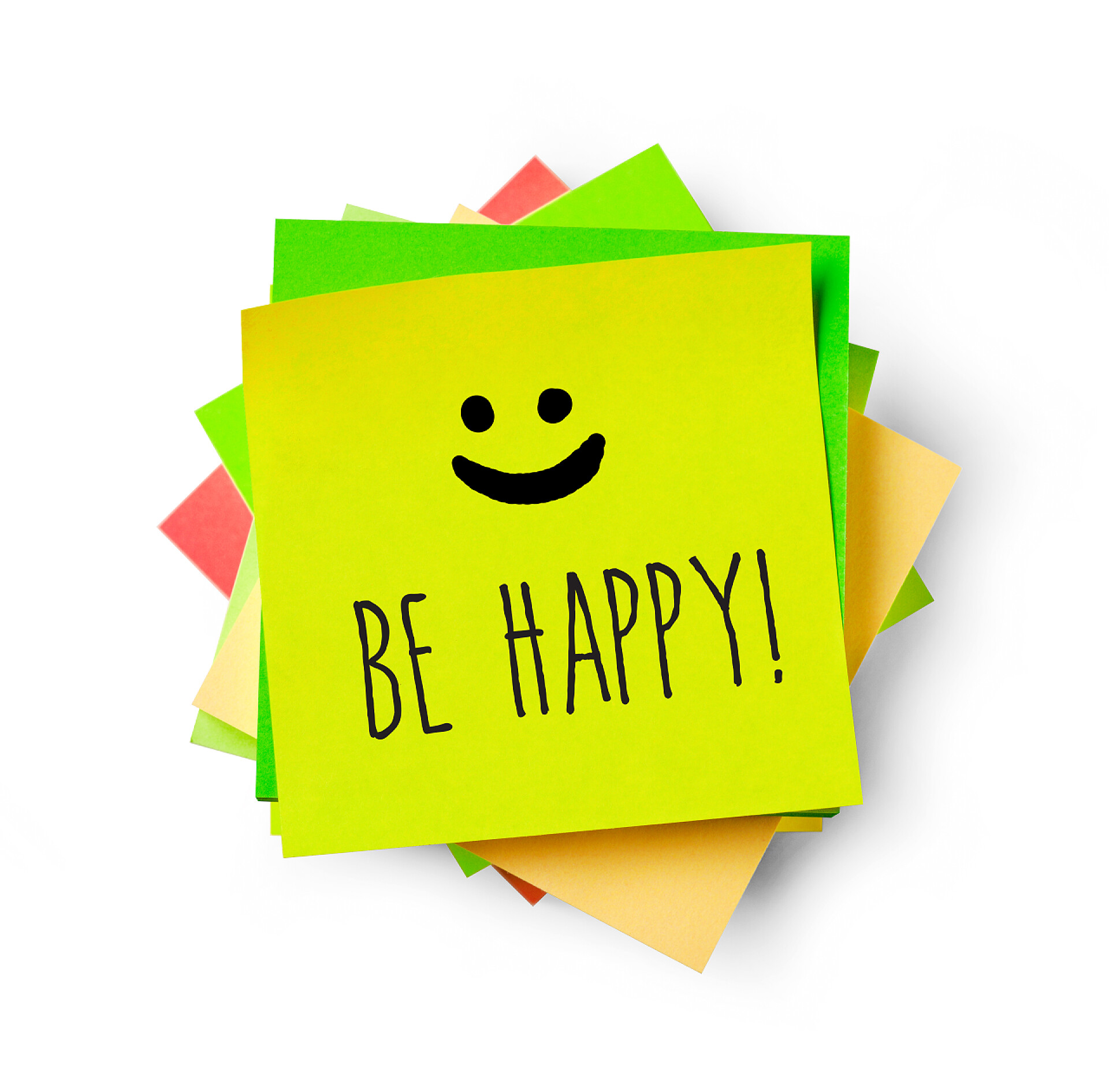 白色背景上的便利贴在胶粘剂注快乐留言