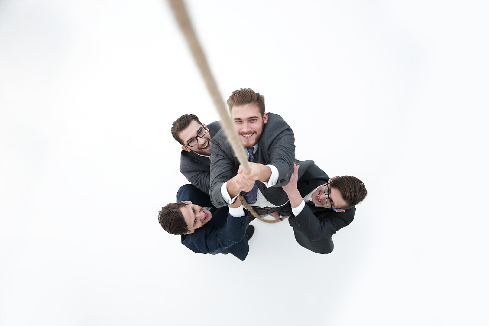 顶级视图创意图团队合作的理念协助董事攀登绳索的业务团队.