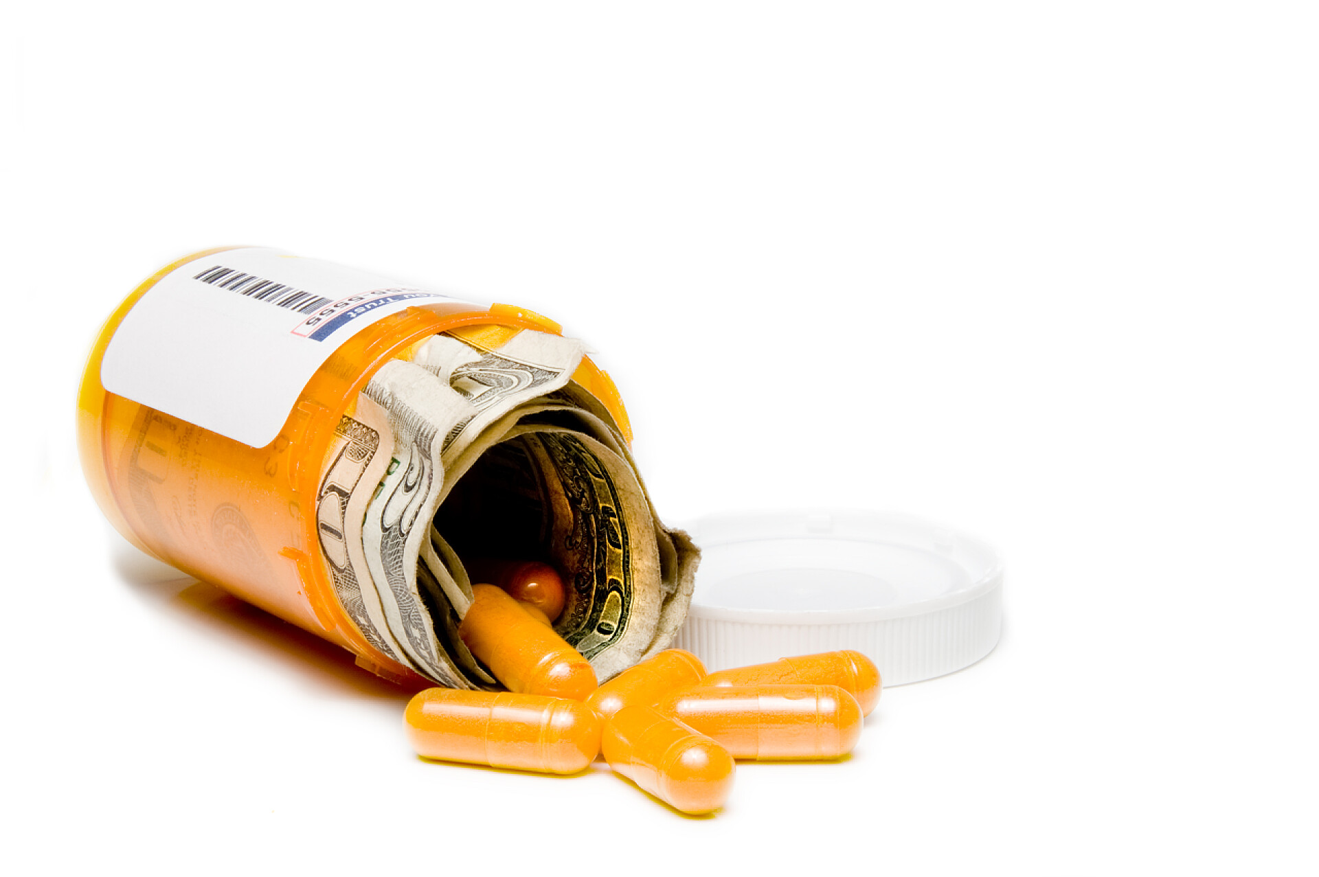 白色背景上一瓶西药高额的医疗费用