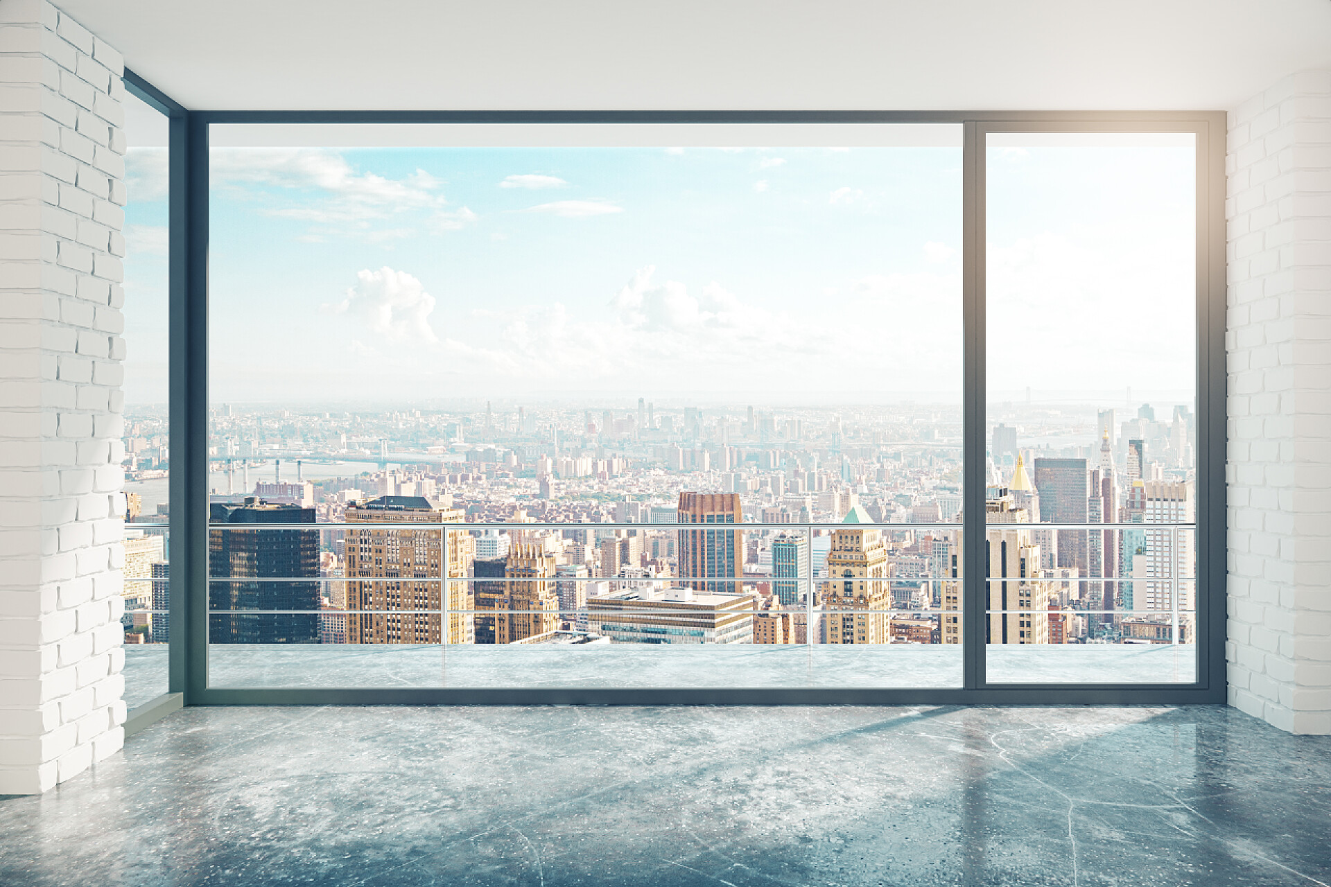透过室内宽敞明亮的窗户看外面的城市风景空阁楼风格与混凝土楼板和城市景观的房间