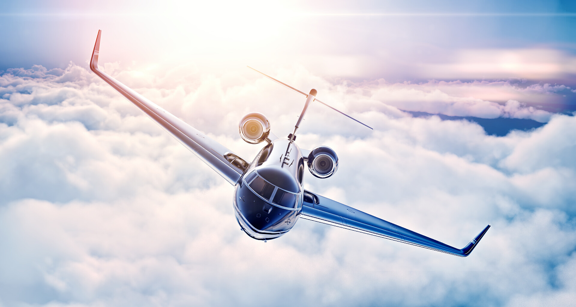 空中飞行的飞机Picture of black luxury generic design private jet flying in blue sky at sunset. Huge white clouds background. Business travel picture. Horizontal, top view. 3d rendering