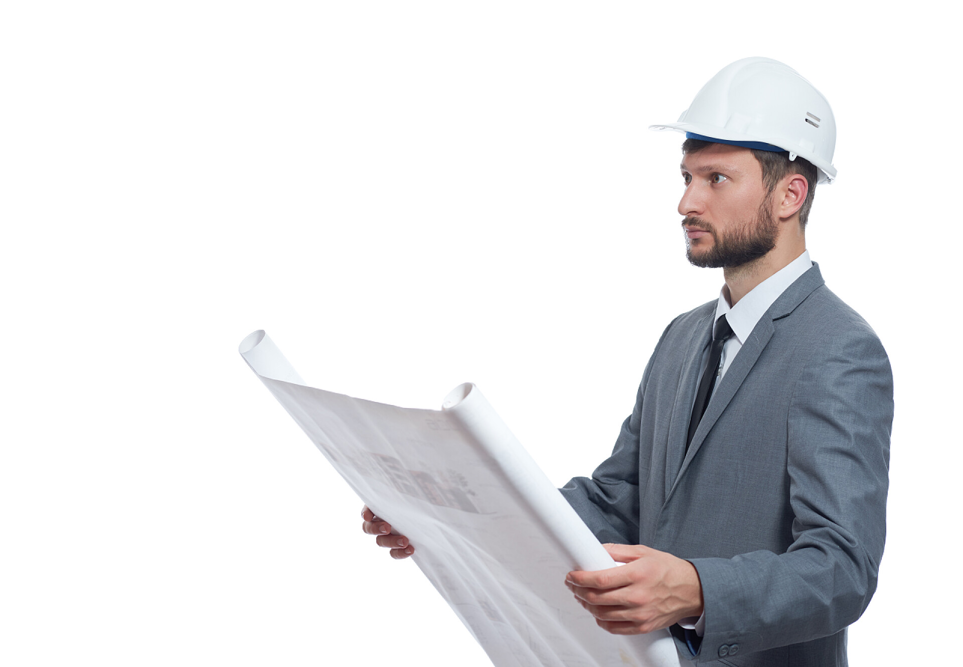 白色背景上的建筑师建筑师在安全帽控股的建筑平面图.