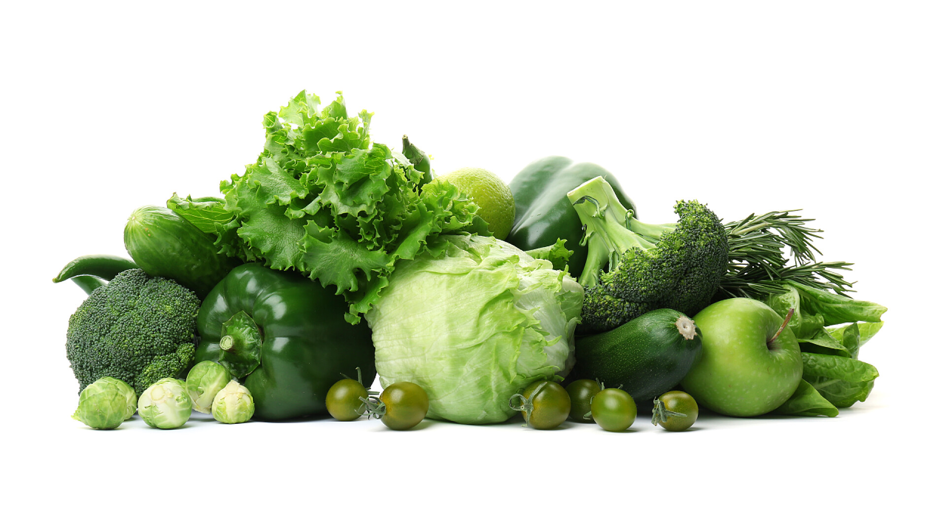 白色背景前的蔬菜绿色蔬菜和水果的白色背景。食品摄影