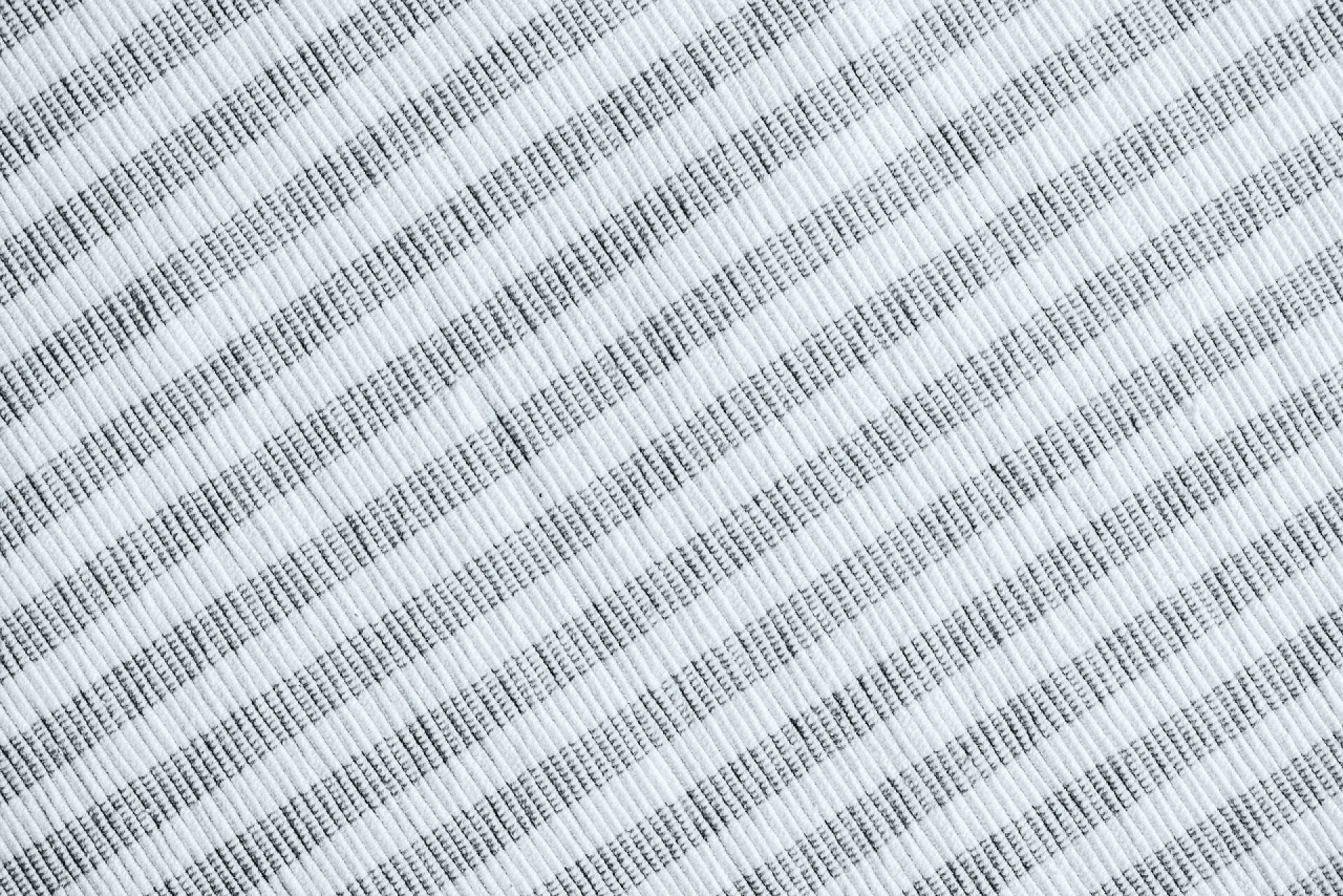 黑白相间的条纹布条纹织物背景的全帧图像