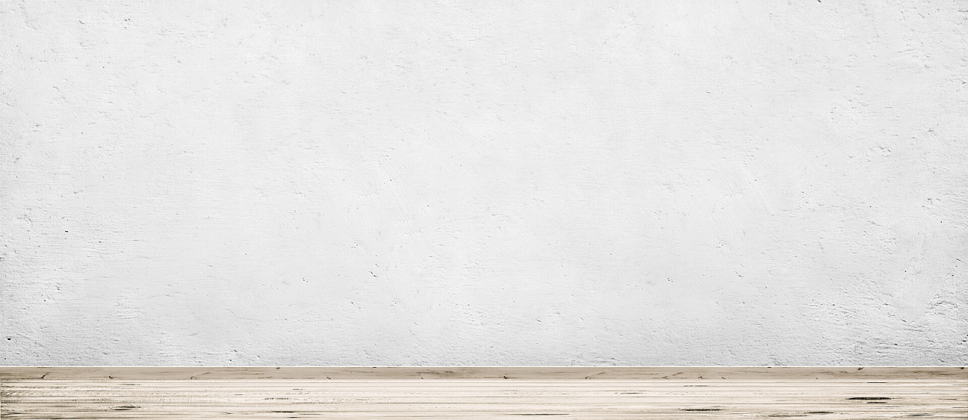 白色的墙壁和木质的桌子室内老式的白色混凝土墙和木地板背景