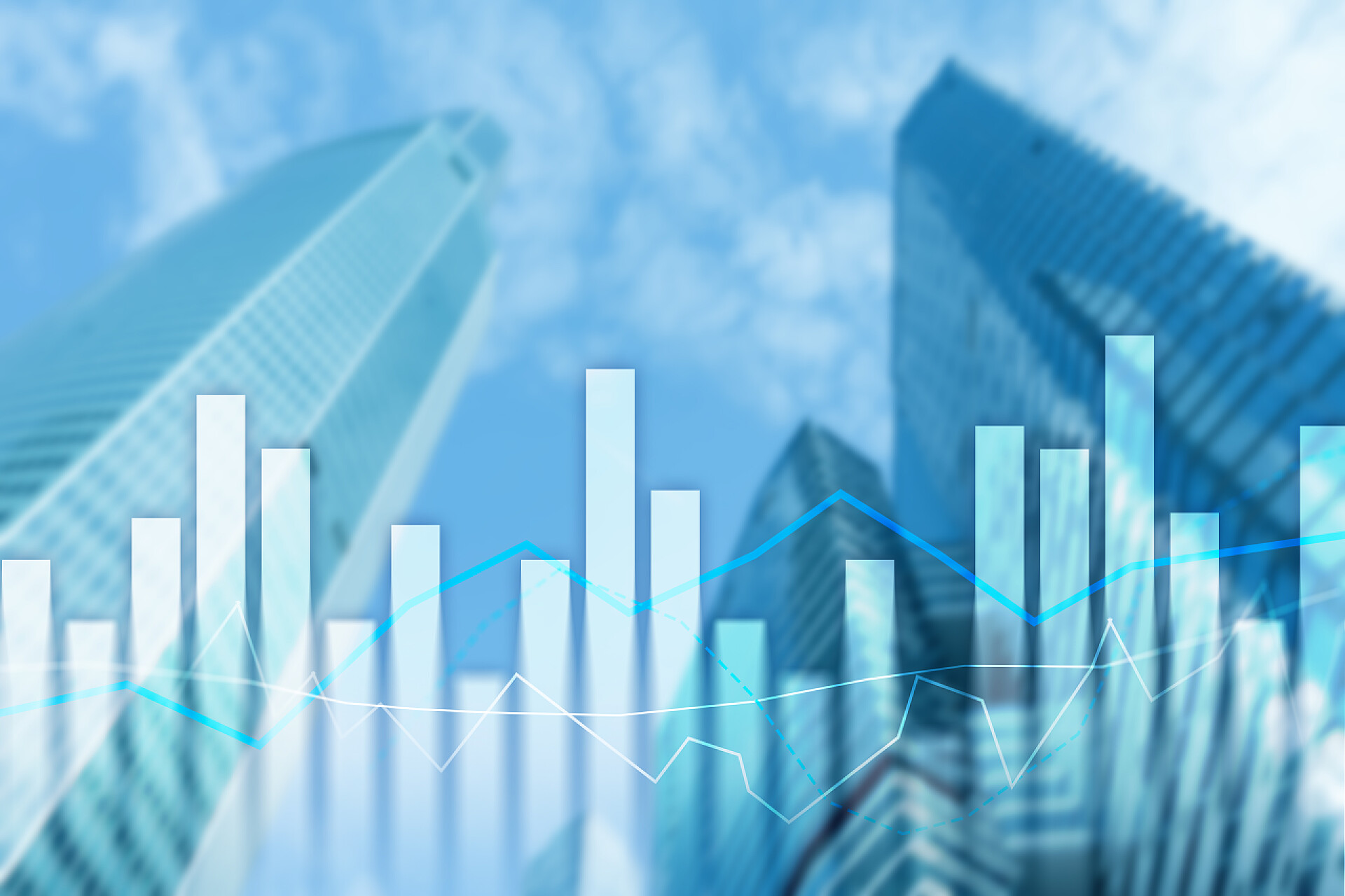 金融投资理财在蓝天白云下的三座高楼大厦和数据分析图