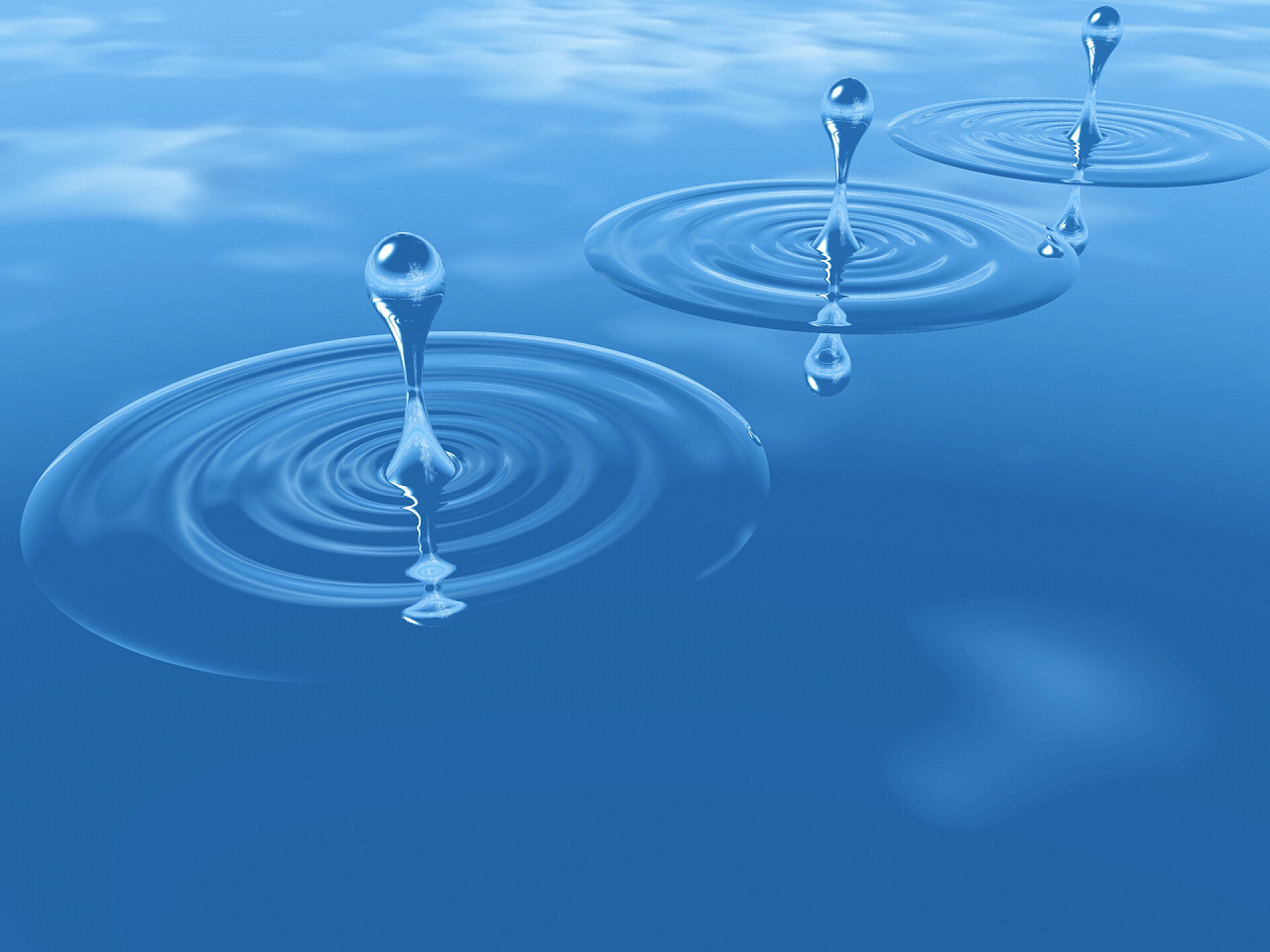 蓝色背景上的水滴蓝色背景上滴