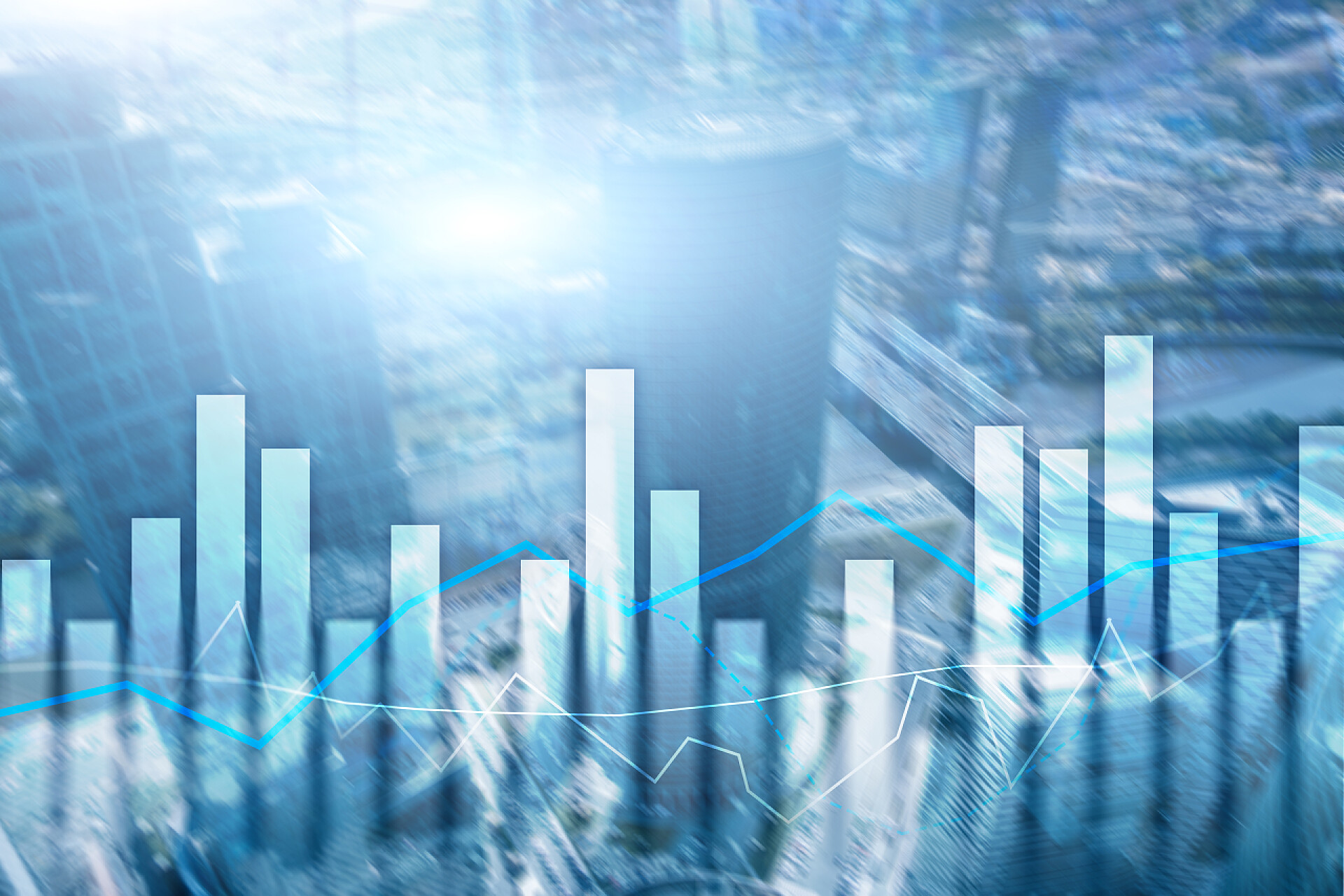 城市背景上的财务图财务图和图表在商业中心的模糊背景。投资和交易概念.