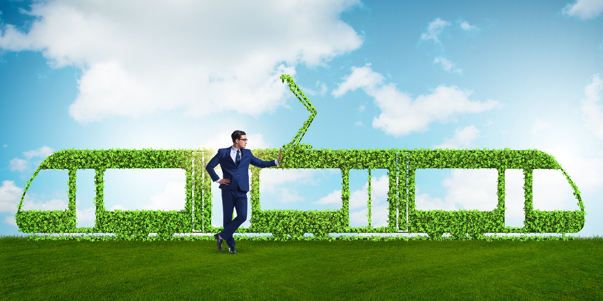 绿色环保车与商人拥有绿色生态车的商人