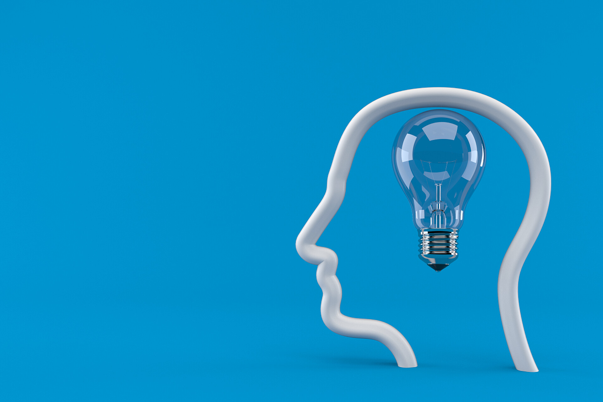 蓝色背景下的轮廓面灯泡有侧面的灯泡