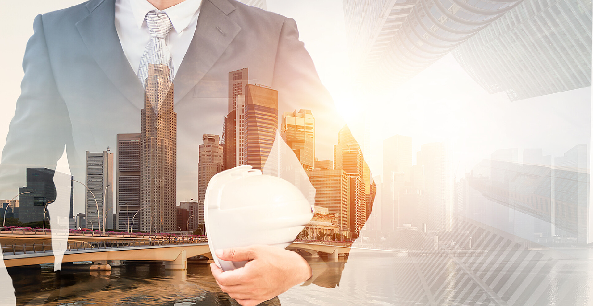 一个工程师置身于现代化城市背景中未来建筑工程的概念与双曝光平面设计.从事现代民用设备技术工作的建筑工程师、建筑师或建筑工人.