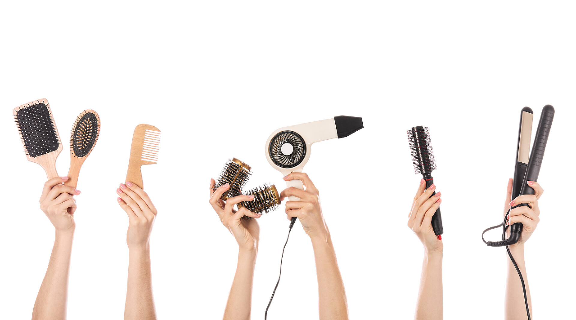 手拿理发工具的人许多手拿着发型师的白色背景用品的人