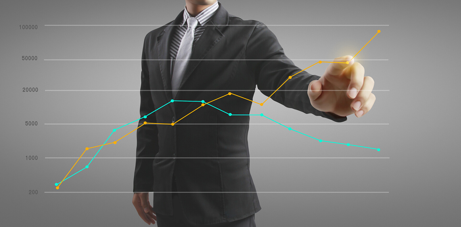 年轻人指向面前的虚拟财务和会计市场经济分析图表手摸财务指标图表和会计市场经济分析图表