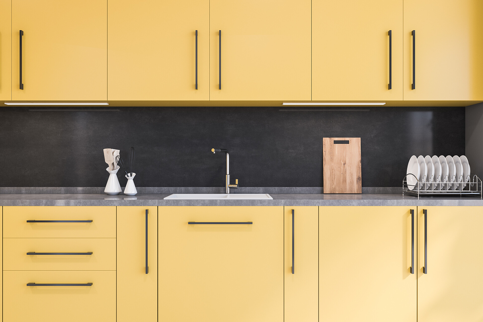 3D渲染建筑模型现代化厨房室内设计舒适的黄色橱柜，内置水槽，矗立在现代厨房的黑色墙壁。3d渲染