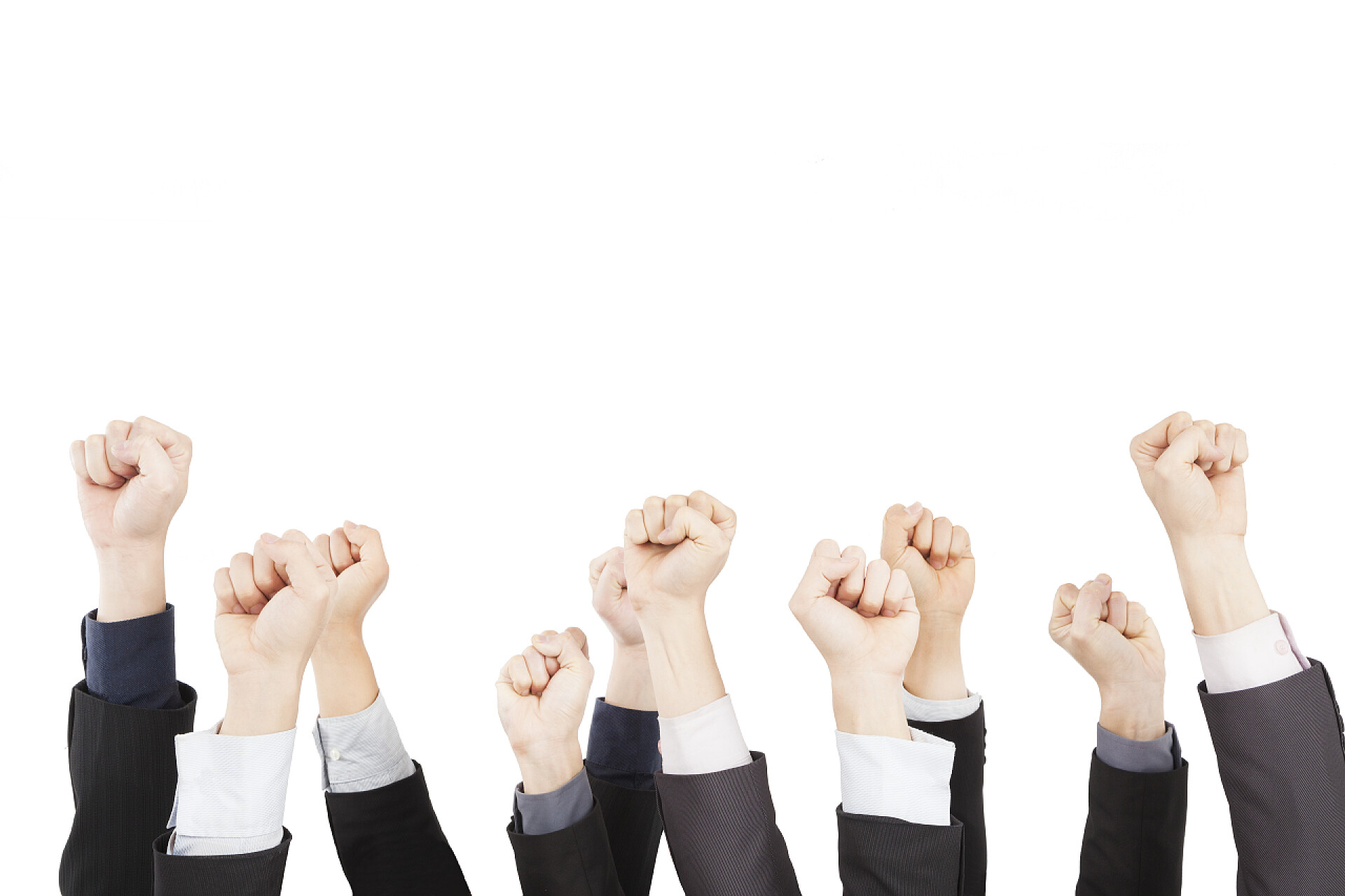 商务人士团队举手握拳加油业务组与拳头笔势的手