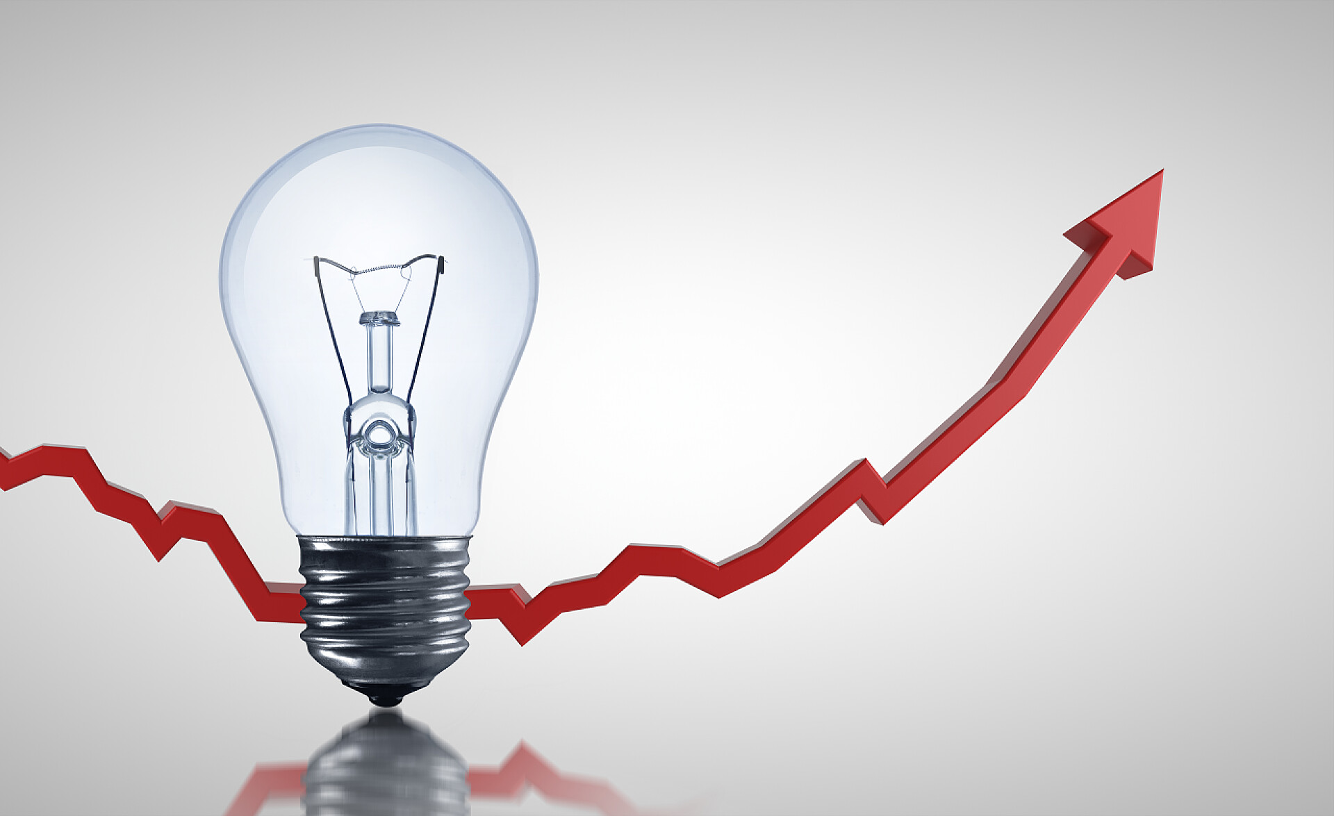 白色背景上的灯和红色上升箭头